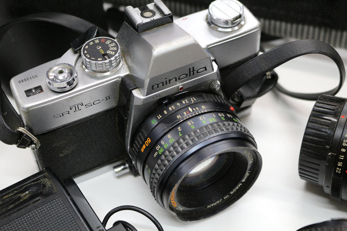 Minolta SRT SC-II 35mm Camera with 4 Lenses & Strap – Untested