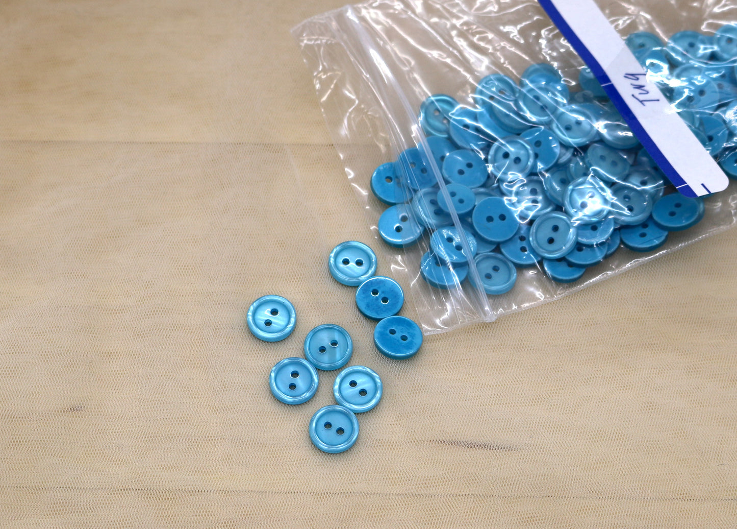 Light Blue Button Mix – 2-Hole, Assorted Sizes