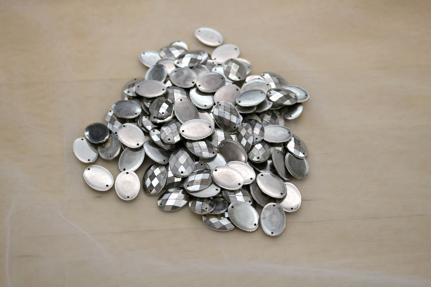 Silver Plastic Faceted Oval Bead