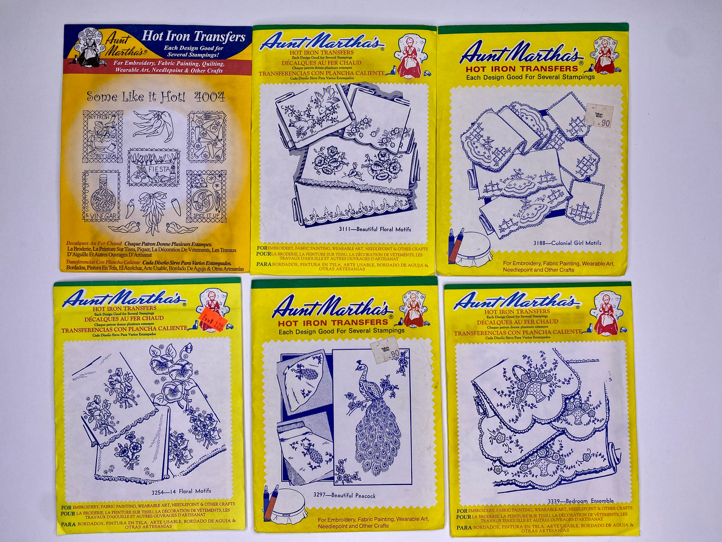 Aunt Martha's Hot Iron Transfers #4004 Some like it hot, 3254 Floral Motifs, 3111 Beautiful FLoral Motifs, 3297 Peacocks, 3188 Colonial Girl, 3339 Bedroom Ensemble
