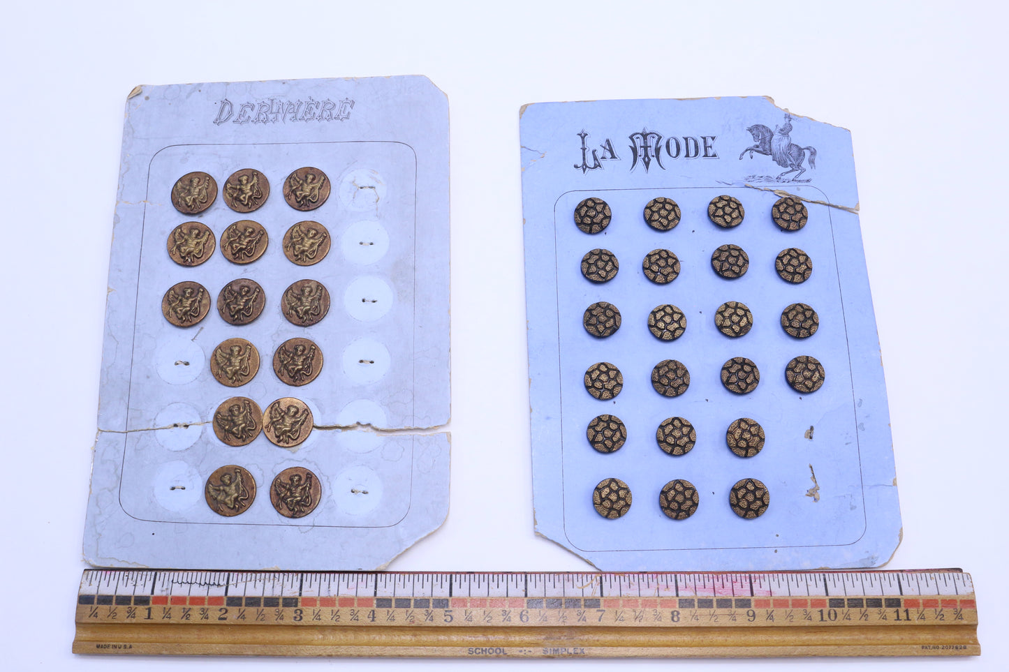 Vintage La Mode Buttons Cracked Gold or Weird Guy Buttons