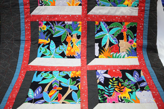 Handmade Safari Animal Crib Blanket – Well-Loved & Full of Life