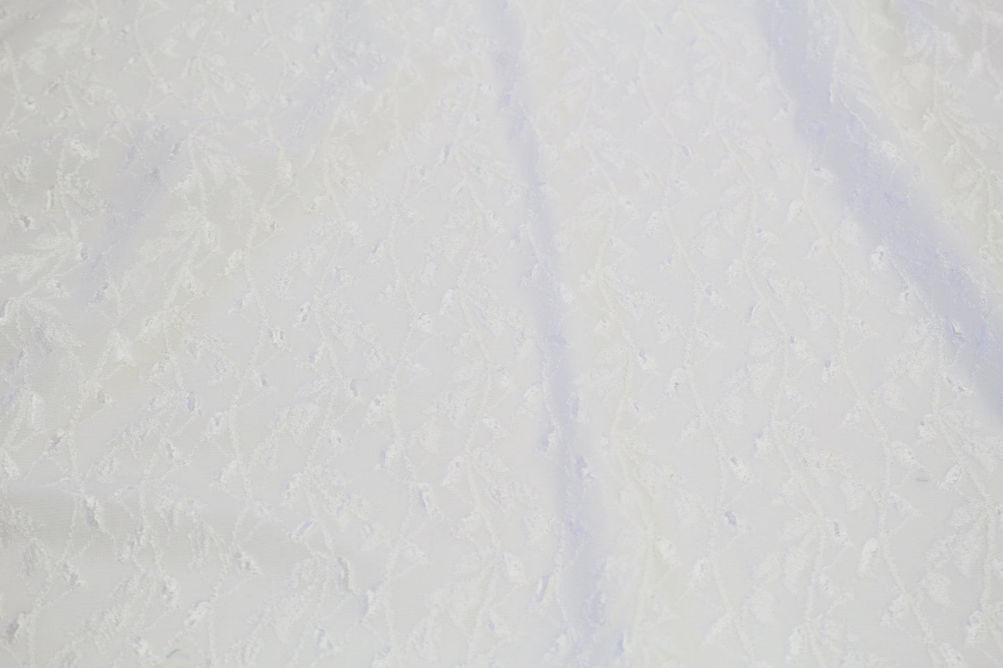 Stretchy White Fabric with Vine Embellishment – 52" x 2 Yards