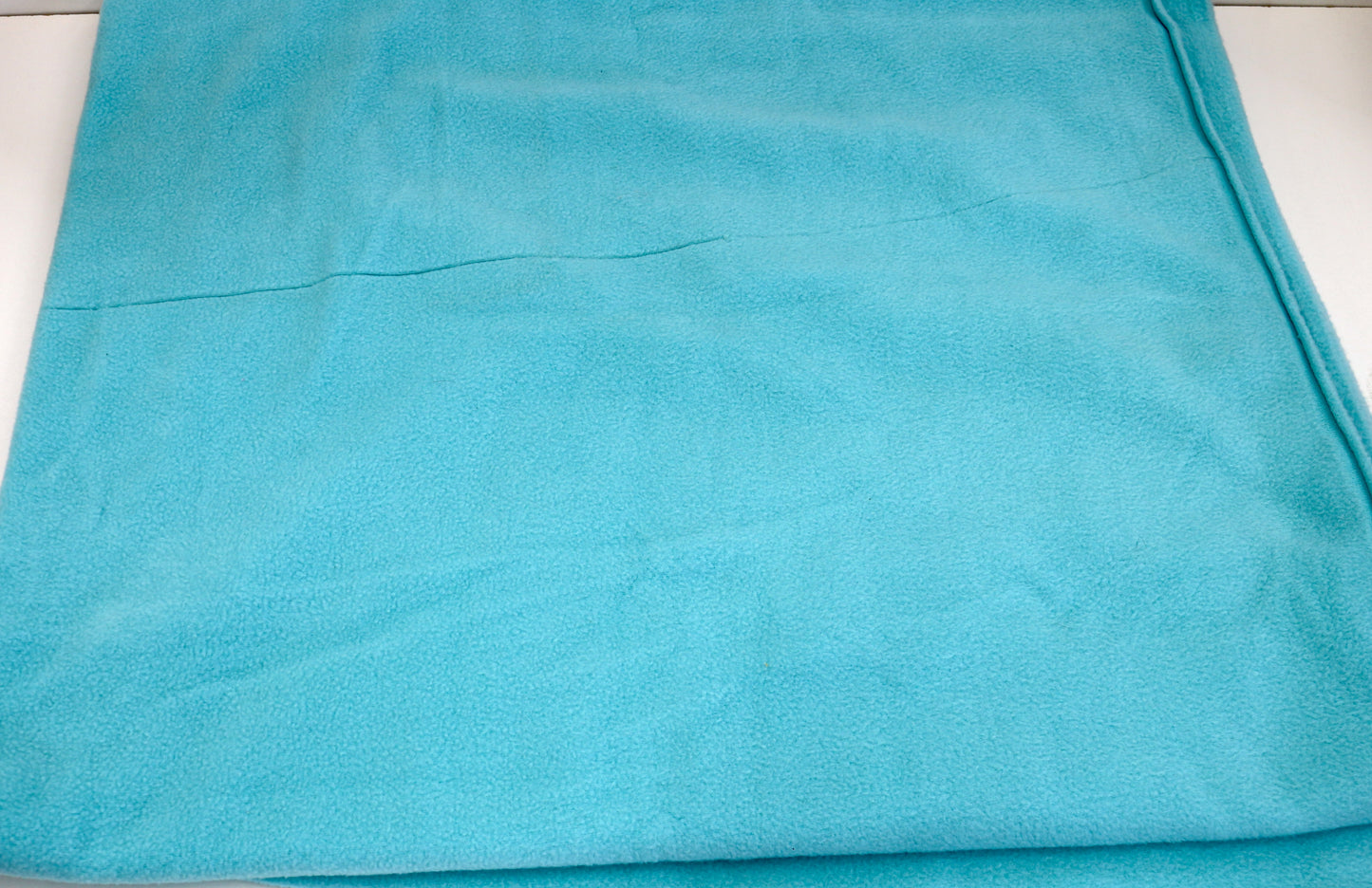 Turquoise Fleece Fabric – 64" x 3 Yards (Flawed)
