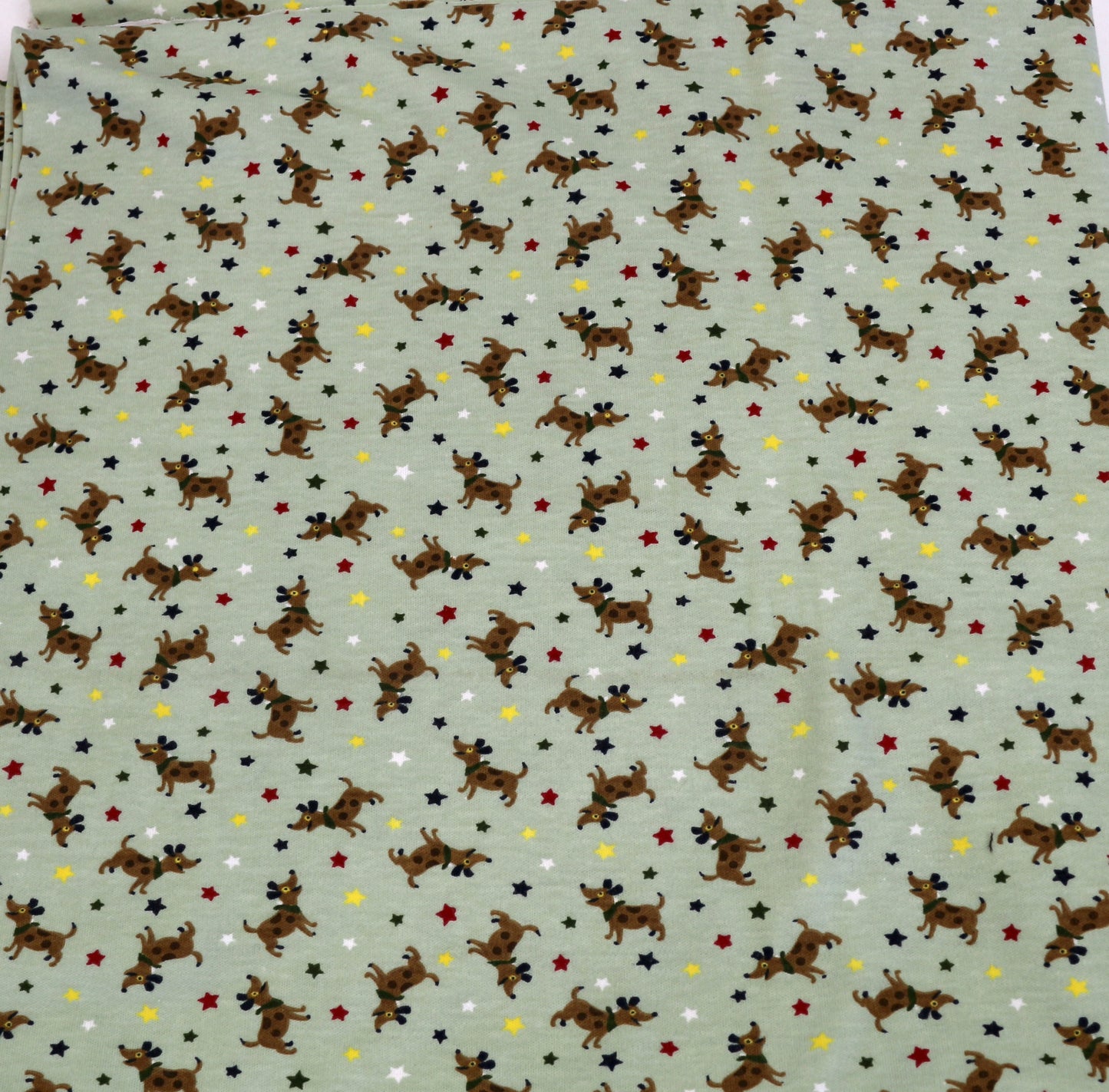 Green 2-Way Stretch Knit Fabric with Little Dogs – 60" x 1.75 Yards