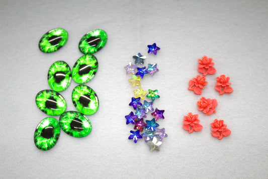 Mixed Embellishment Lot – Green Eyes, Iridescent Stars & Coral Flowers