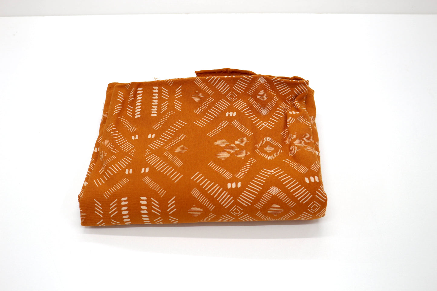 Burnt Orange Geometric Knit Fabric – 60" x 1 Yard (Midweight) 🧡