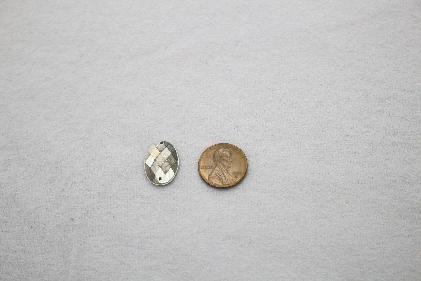 Silver Plastic Faceted Oval Bead