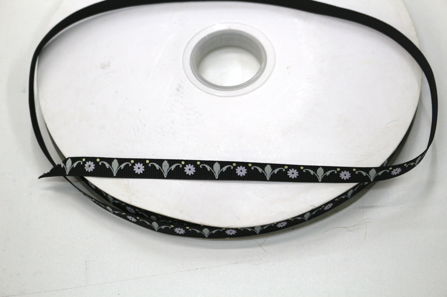 Black Ribbon with Flower Detail Roll (100 yds) 3/8"