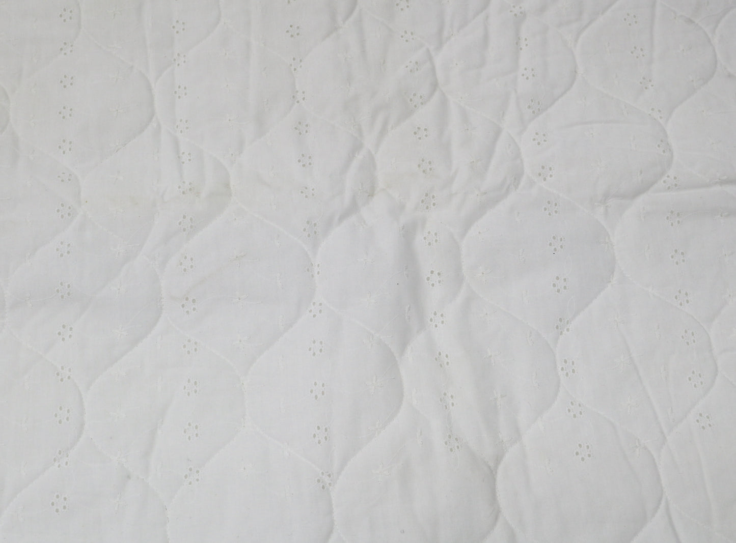 Quilted Eyelet Fabric (some stains) 1 yd