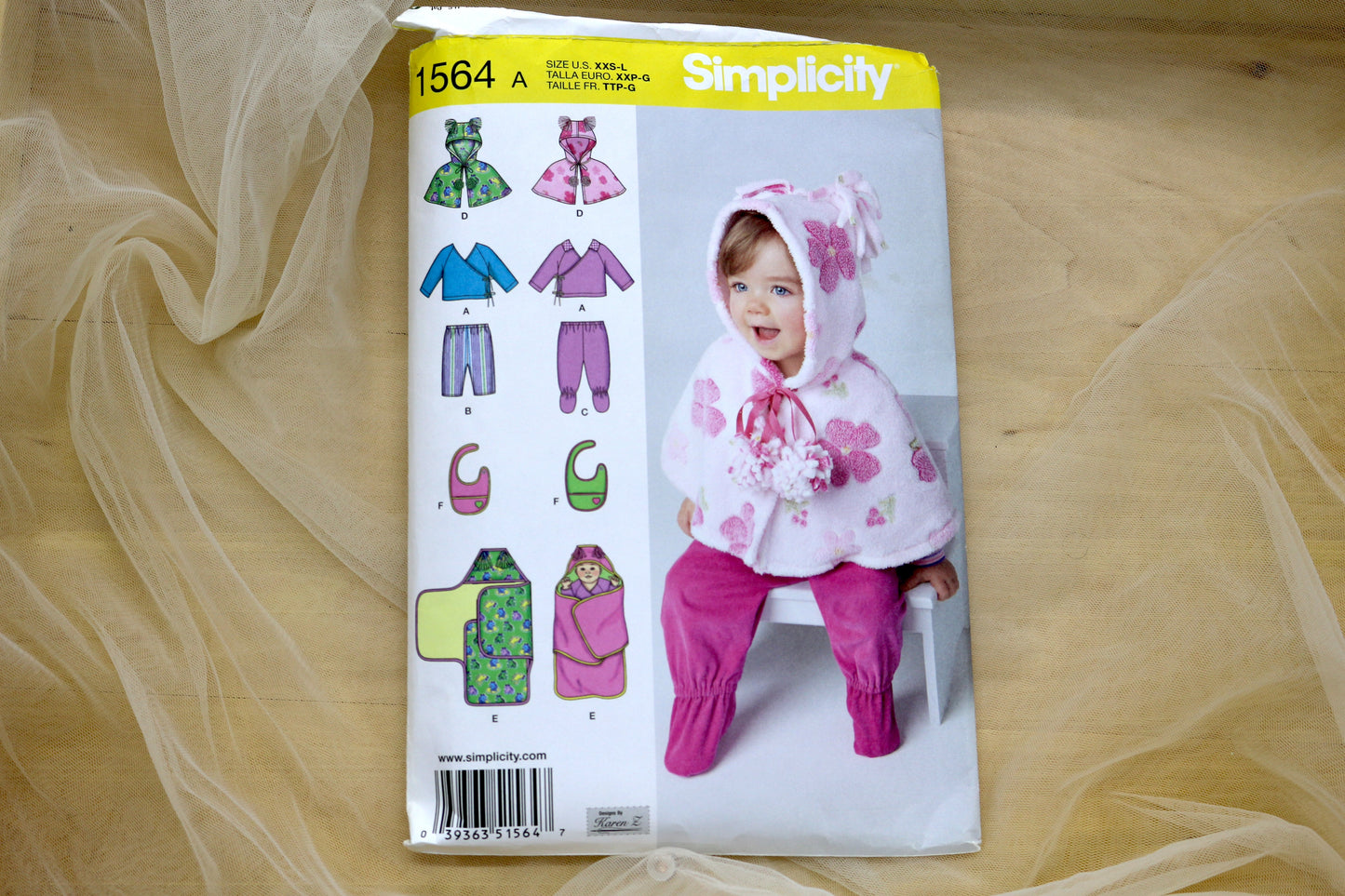Simplicity 1564 Babies Top, Pants, Capelet, Bib and Blanket Sewing Pattern