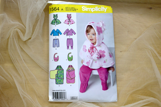 Simplicity 1564 Babies Top, Pants, Capelet, Bib and Blanket Sewing Pattern