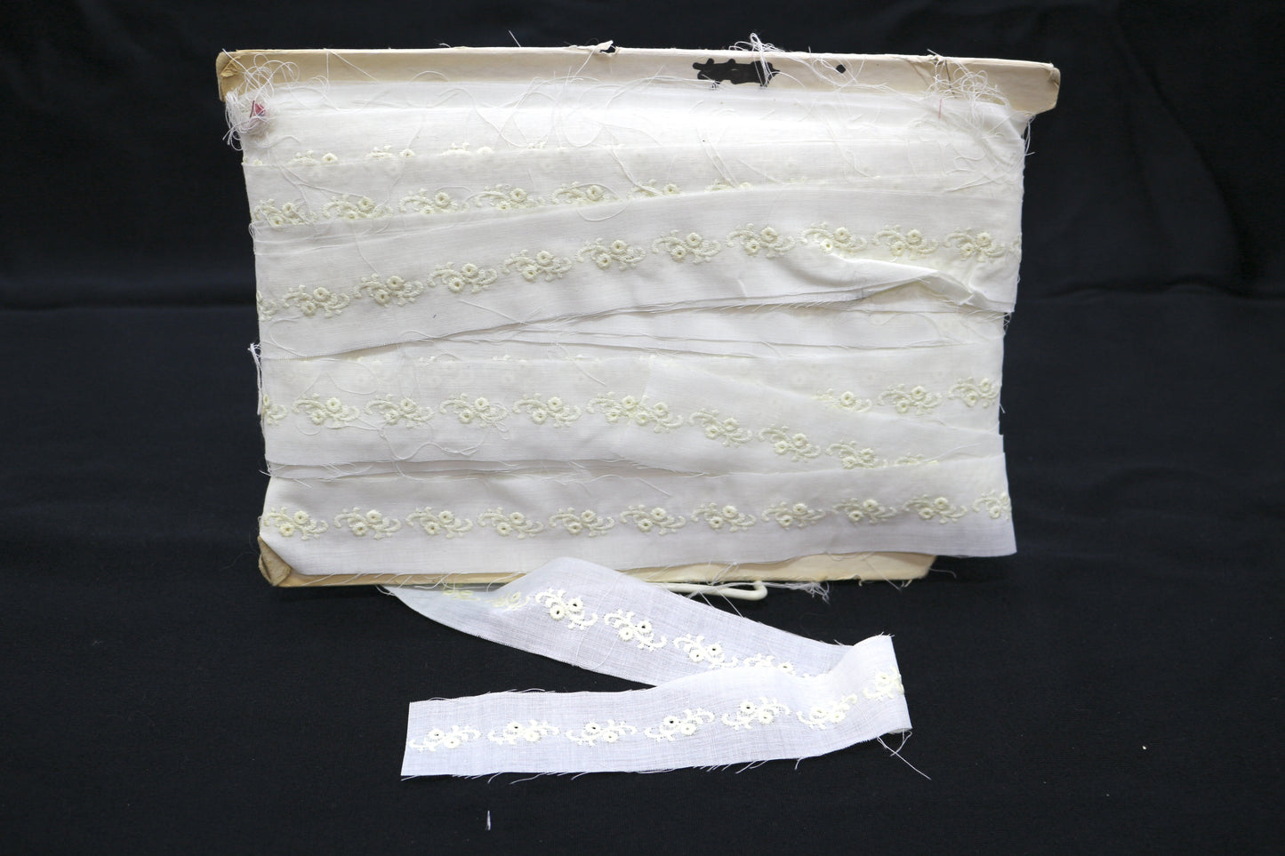 Small Bolt of White Trim with Embroidered Flower Design
