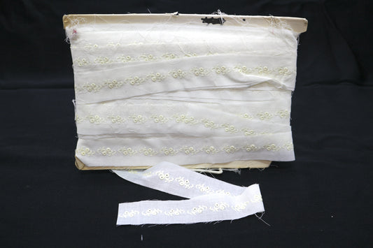 Small Bolt of White Trim with Embroidered Flower Design