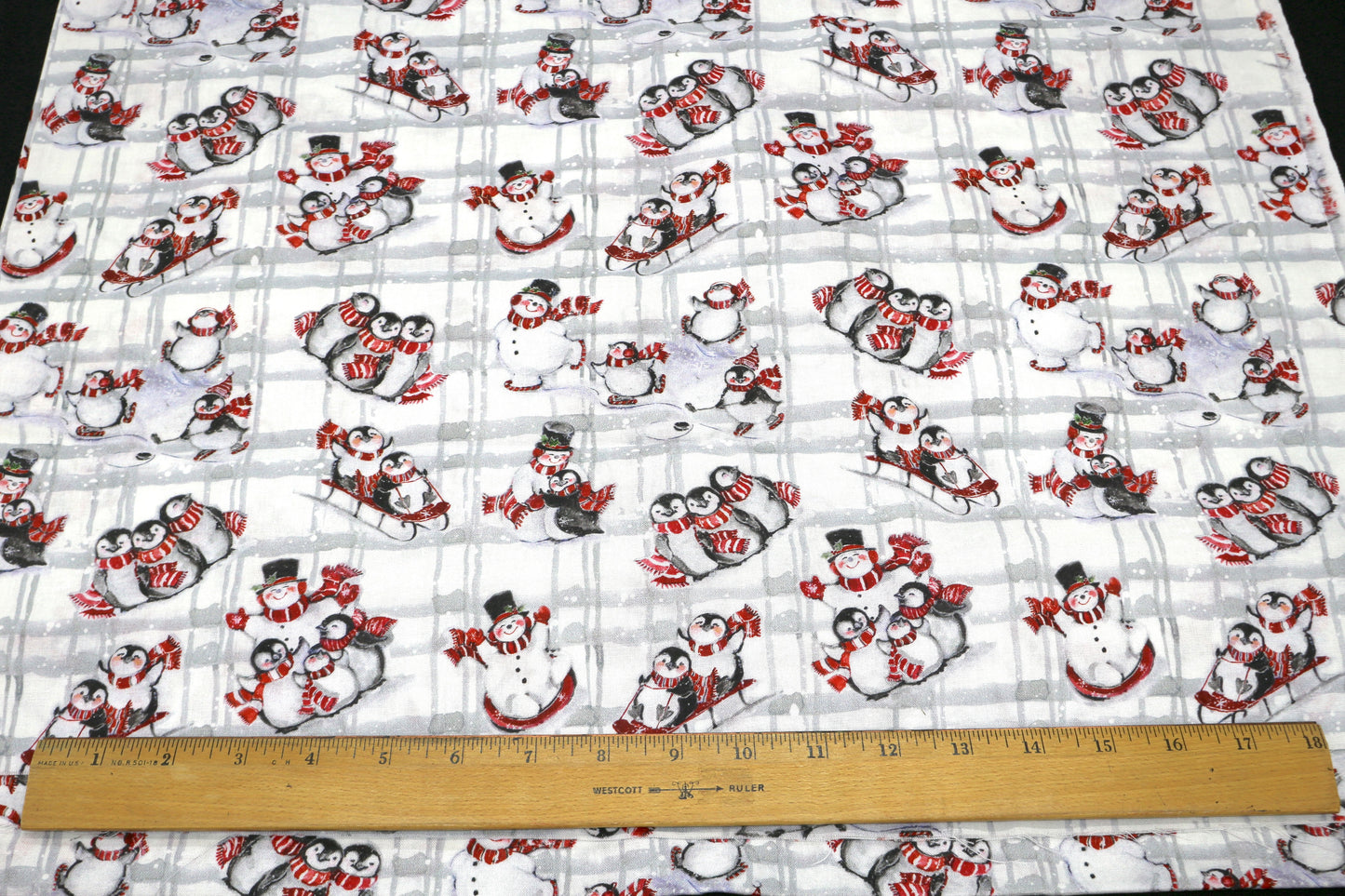Penguin and Snowman Playing Flannel Fabric 45" x 2 yd
