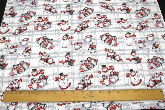 Penguin and Snowman Playing Flannel Fabric 45" x 2 yd