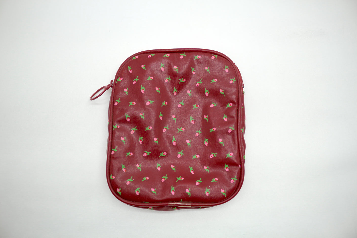Blooming Nostalgia: Retro Zip Bag with Rosy Charm