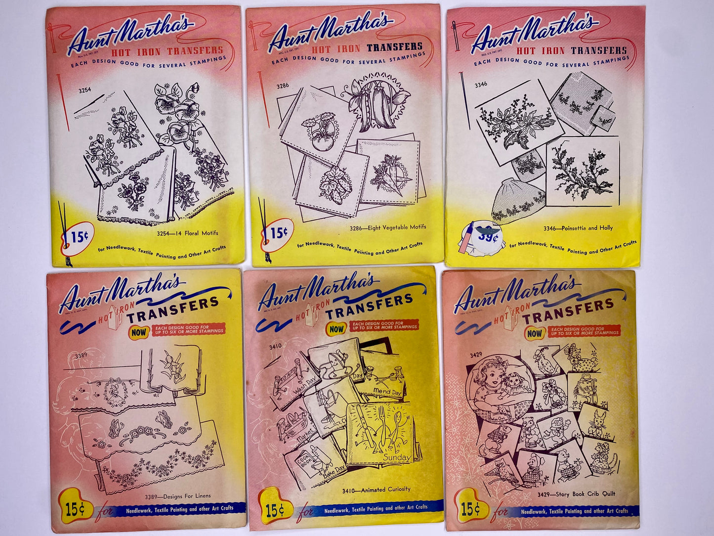 Aunt Martha's Hot Iron Transfers 3254 Floral Motifs, 3389 Designs for Linens, 3286 Eight Vegetables, 3410 Animated Curiosity, 3346 Poinsettia and Holly, 3429 Story Book Crib Quilts